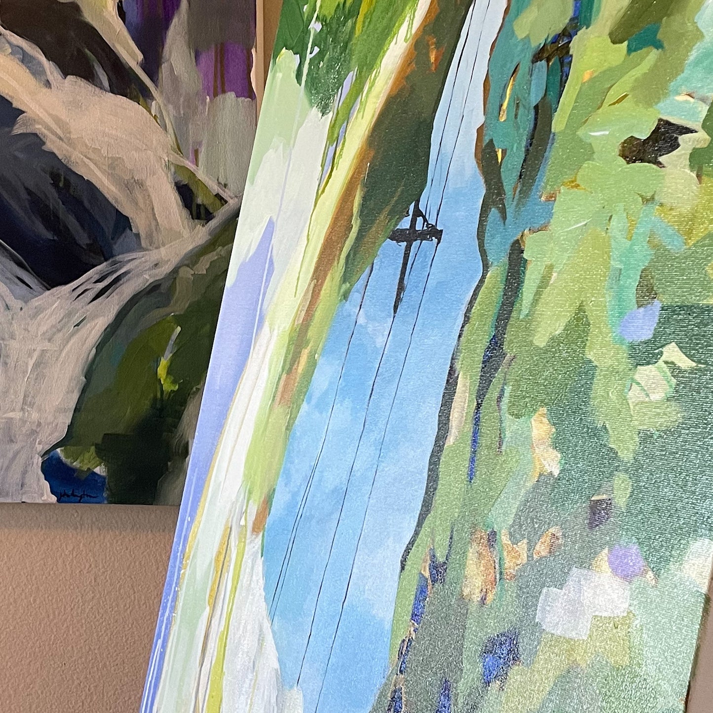 View of the painting from the side. It has a glossy sheen.